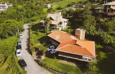 Fantástica casa em garopaba na praia da vigia em frente ao mar com vista panorâm
