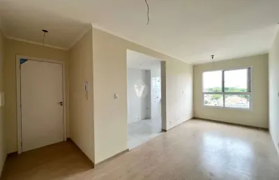 Apartamento de 2 dormitórios e com vaga de garagem.