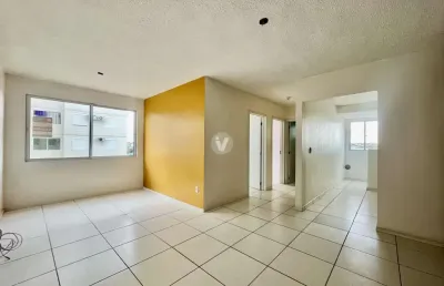 Apartamento 2 dormitórios em andar alto próximo ao hospital regional.
