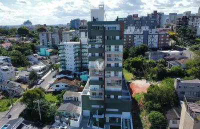 Apartamento 2 dormitórios com suíte e 2 vagas de garagem.