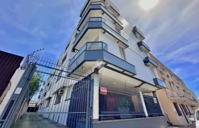 Apartamento térreo 2 dormitórios + dependência no centro de santa maria.