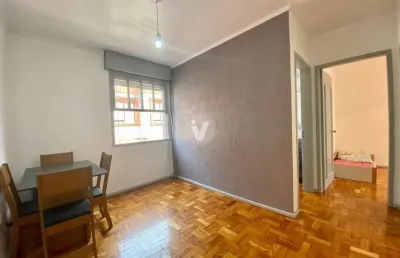 Apartamento central 2 dormitórios com vaga de garagem