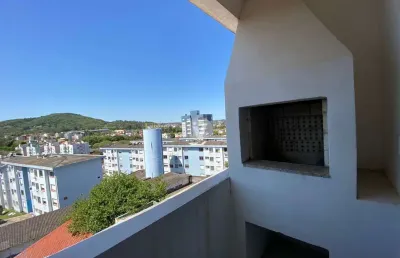 Apartamento de dois dormitórios com sacadas e vaga de garagem