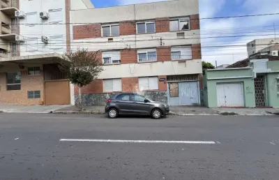 Amplo apartamento central de 3 dormitórios com suíte e box de garagem duplo
