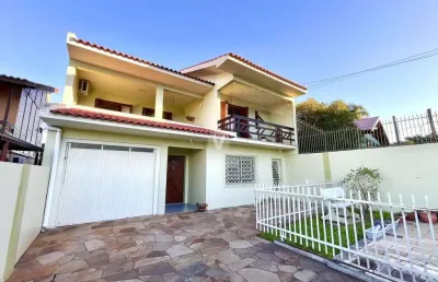 Excelente casa a venda, três dormitórios sendo um suíte.