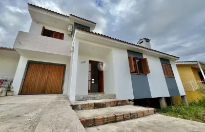 Ampla casa no novo horizonte com 3 dormitórios e 2 vagas de garagem!