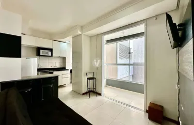 Um dormitório com garagem semi-mobiliado ao lado da fadisma.