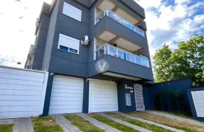 Apartamento 2 dormitórios com suíte, sacada, churrasqueira e garagem