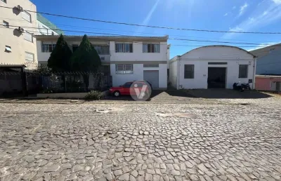 Casa comercial excelente localização com loja e pavilhão