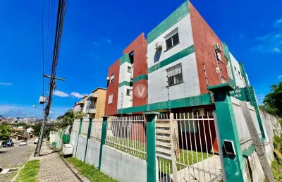 Apartamento 2 dormitórios com churrasqueira e garagem
