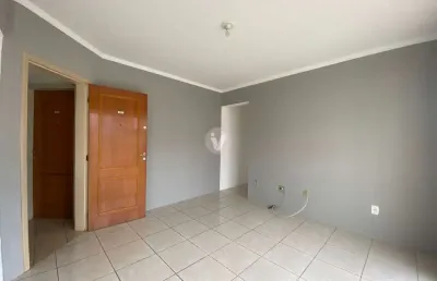 Apartamento 2 dormitórios no centro, próximo a ufn, com elevador e sacada.