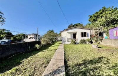Casa com 3 dormitórios e amplo terreno no bairro tomazetti