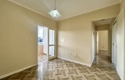 Apartamento dois dormitórios com box de garagem no bairro camobi.