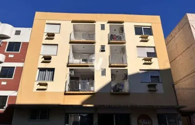 Apartamento de 2 dormitórios , sacada, em frente à parada de ônibus para a ufsm