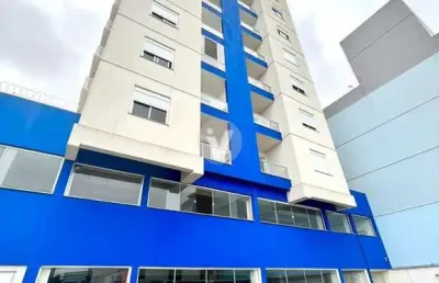 Apartamento de 2 dormitórios, sacada, churrasqueira e box de garagem, próximo à