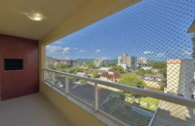 Apartamento 2 dormitórios com suíte e garagem, próximo à rotula da ufsm!