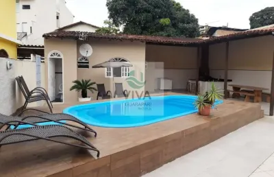 Casa  composta por 4 quartos com área de lazer á venda no bairro ipiranga, guarapari-es - realize negócios imobiliários.