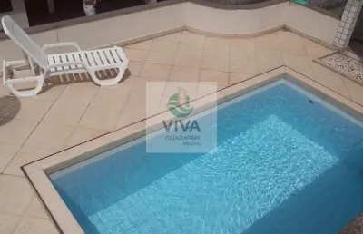 Casa de 3 quartos com área de lazer completa em condomínio fechado na praia do morro