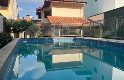 Belíssima e confortável casa à venda no jd. santa adelaide em jundiaí - a/c 241 m², piscina, excelente quintal arborizado, localização privilegiada.