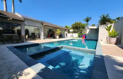 Casa  venda no condomínio acapulco, 07 dormitórios, com lazer privativo, finamente decorada