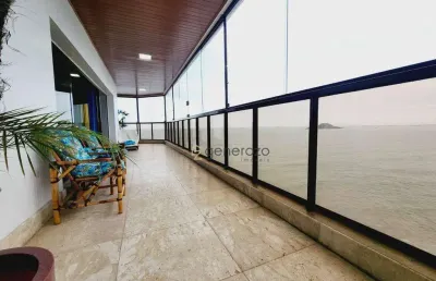 Apartamento a venda na praia das astúrias, frente ao mar, 03 dormitórios, 03 vagas de garagem e lazer