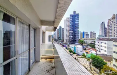 Apartamento a venda na praia das astúrias, 02 dormitórios, com sacada e 01 vaga de garagem