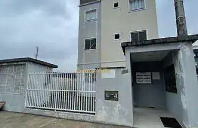 Apartamento com dois quartos e churrasqueira no jardim iririú