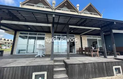 Sobrado geminado triplex em condomínio com 3 suítes à venda no bairro itajuba em barra velha-sc por r$ 1.500.000,00.