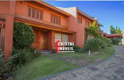 Casa em condomínio com 4 dormitórios sendo 2 suítes e 2 vagas a venda no bairro cristal (poente do guaíba) - av21712
