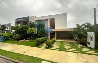 Casa em condomínio decorada e mobiliada 3 quartos suítes 318,31m2 em alphaville litoral norte ii