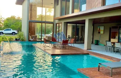 Casa duplex em condomínio 7 suítes sendo 1 suíte máster com 469m2 em praia do forte
