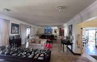 Apartamento quatro suítes, gabinete, sala de tv, duas varandas com 397,00 m2