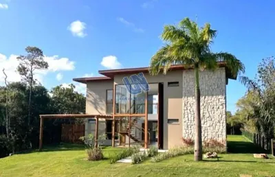 Casa duplex em condomínio na praia do forte com 400m2 de área construída e 800m2 de terreno