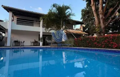 Casa com 5 suítes 600m2 de área construída no itaigara