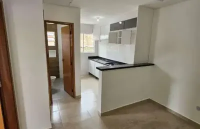Seu lar perfeito em bairro tranquilo: 2 dormitórios, churrasqueira e conforto!