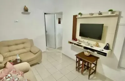 Apto 2 dormitórios prédio frente mar canto do forte semi mobiliado pé na areia