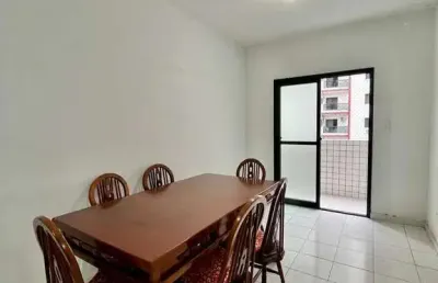 Apartamento de frente 1 dormitório 1 vaga com sacada e armários 300m da praia