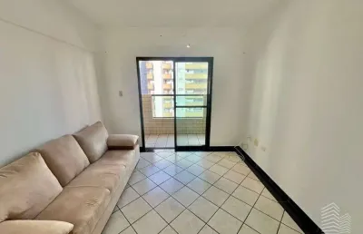 Apartamento semimobiliado 1 dormitório elevador garagem e piscina 400m da praia