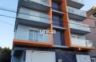 Apartamento 02 dormitórios suíte sacada churrasqueira e garagem próximo a ufsm