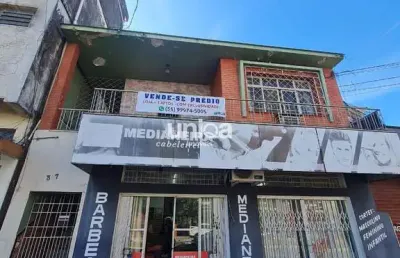 Prédio com loja térrea + 03 aptos na avenida ângelo bolson 367 santa maria rs