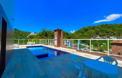 Apartamento novo 2 quartos e 2 vagas praia das toninhas ubatuba