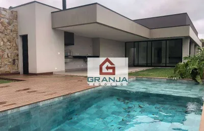 Belíssima e moderna casa terrea à venda com 04 suítes e uma maravilhosa area gourmet com piscina - alphaville - granja viana