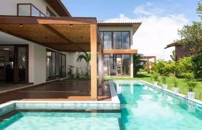 Casa a venda em praia do forte, litoral norte da bahia - condomínio praia bella, acesso direto à praia, 5 suítes de alto padrão com móveis inclusos.