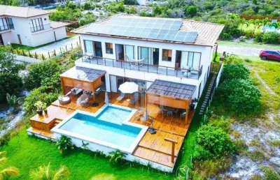 Casa a venda em praia do forte, litoral norte da bahia - condomínio praia bella, acesso direto à praia, 5 suítes de alto padrão porteira fechada.