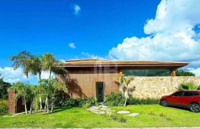 Casa a venda em praia do forte, litoral norte da bahia - condomínio praia bella, acesso direto à praia, 5 suítes de alto padrão porteira fechada.