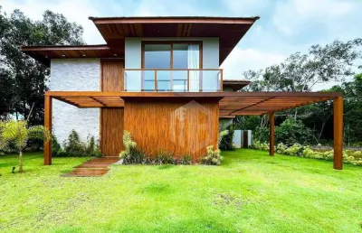 Casa a venda em praia do forte, litoral norte da bahia - condomínio praia bella, acesso direto à praia, 7 suítes de alto padrão perto de tudo.
