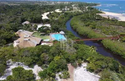 Terreno exclusivo de alto padrão no condomínio enseada do castelo – praia do forte | 800m² | beira-mar | segurança e privacidade