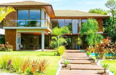 Casa a venda em praia do forte, litoral norte da bahia - condomínio praia bella, acesso direto à praia, 7 suítes de alto padrão perto de tudo.