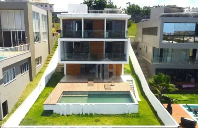 Casa de luxo à venda no alphaville salvador 2 – 4 suítes | vista mar | piscina e automação completa!