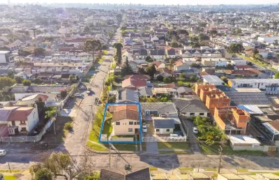 Casa mais sobrado de esquina no boqueirão 262,46 m² totalmente averbados  a 1.000 metros da vila hauer